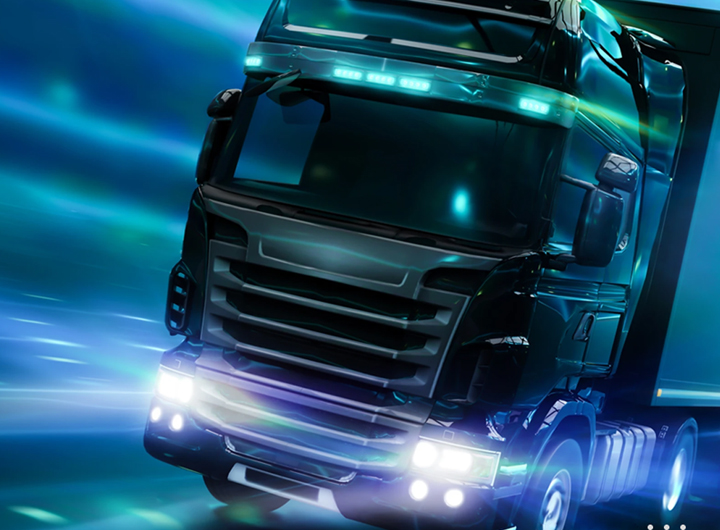 Abstract image of a truck driving at night with lights blurred in the background