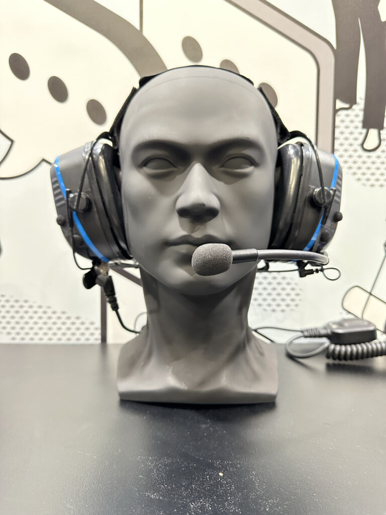 Sensear smart headset on a mannequin head.